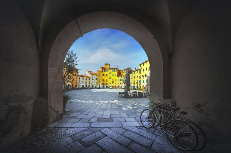 Lucca, Piazza dell' Anfiteatro square from entrance arch. Tuscany, Italy